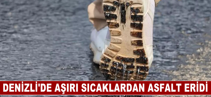 Denizli'de aşırı sıcaklarda yolun zeminindeki asfalt eridi