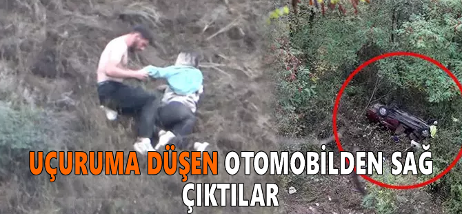 Uçuruma düşen otomobilden sağ çıktılar, 200 metrelik uçurumda kurtarılmayı beklediler